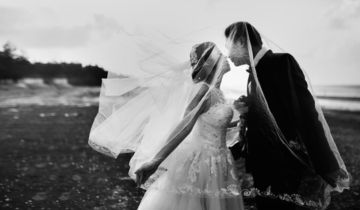 Bride and groom photographed from above with bouquet