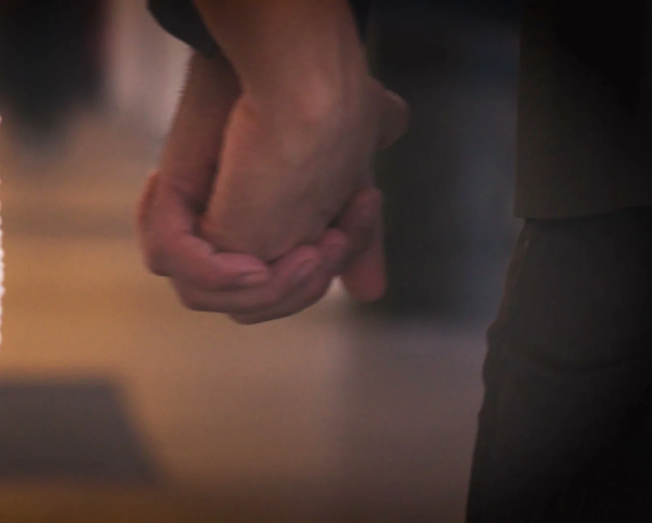 Hands held close